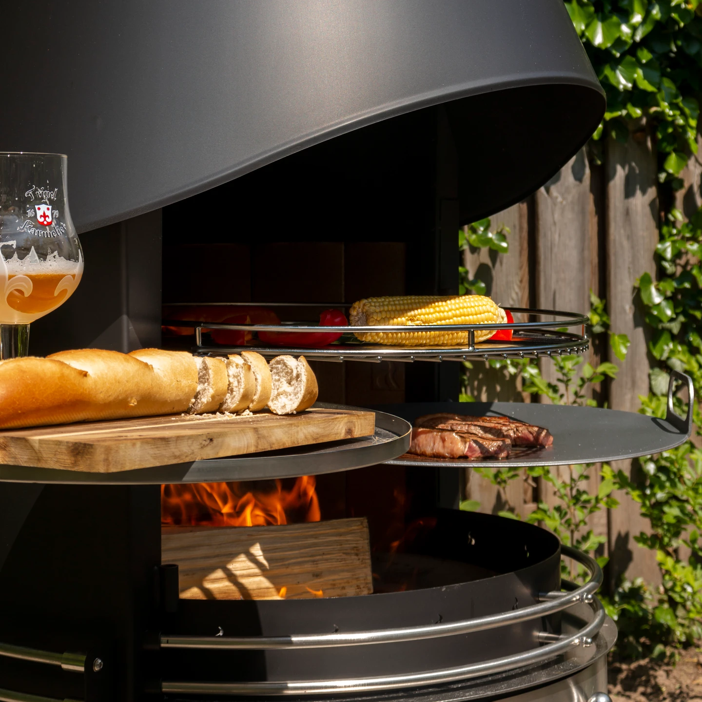Girse Design RVS buitenhaard. Geschikt voor barbecue. Diverse mogelijkheden voor outdoorcooking. Exclusief buitenleven.